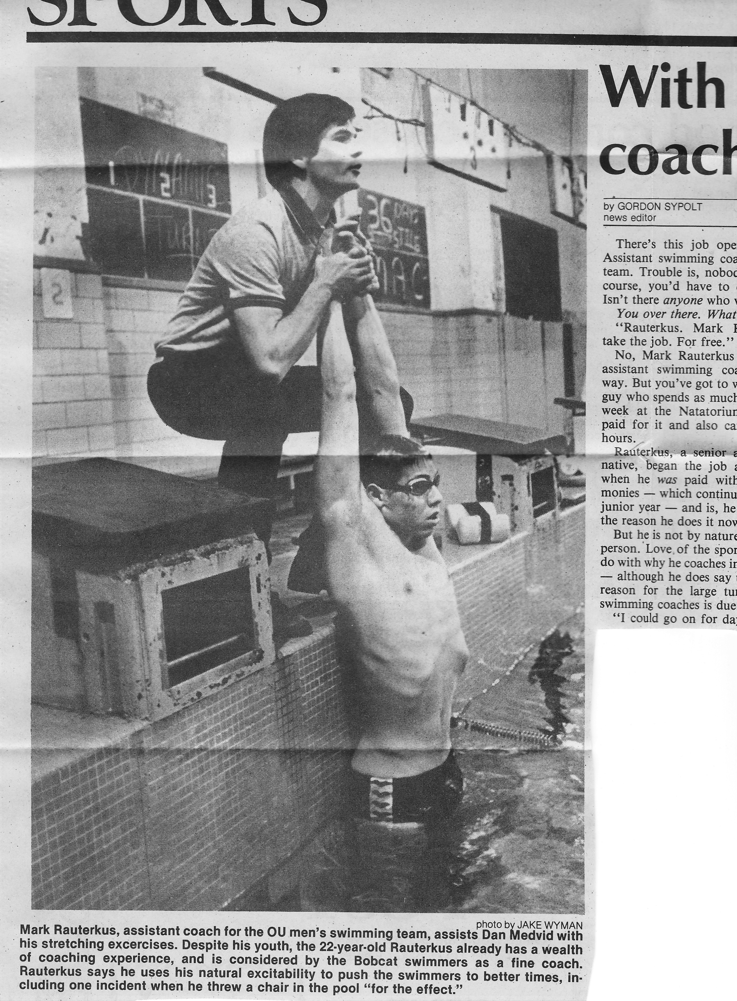 Photo of swimmer being stretched in the old OU swim pool